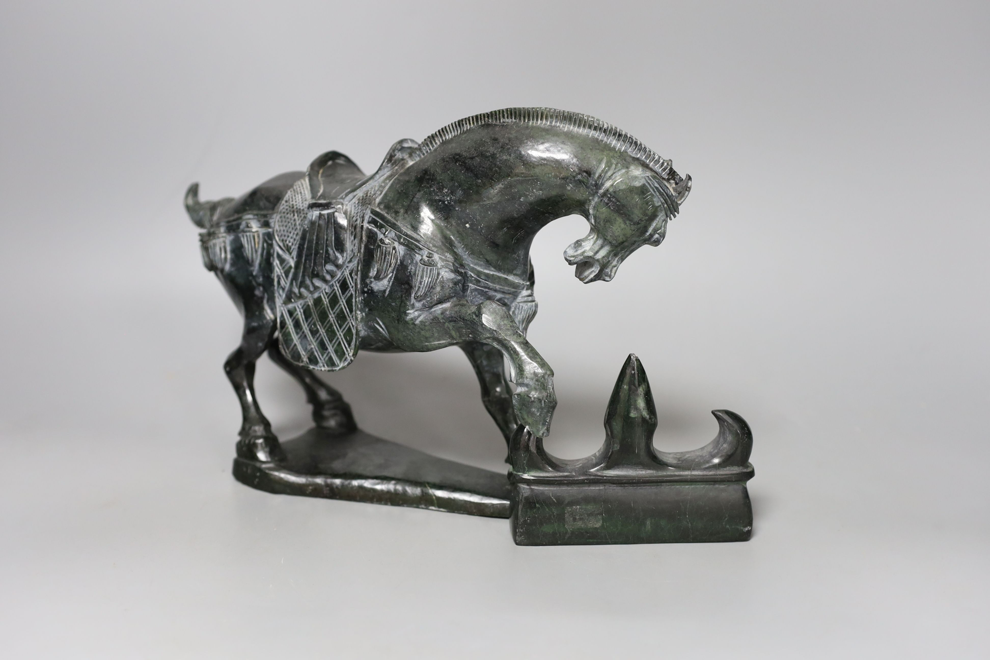 A Chinese 20th century Tang style soapstone horse - 19cm tall